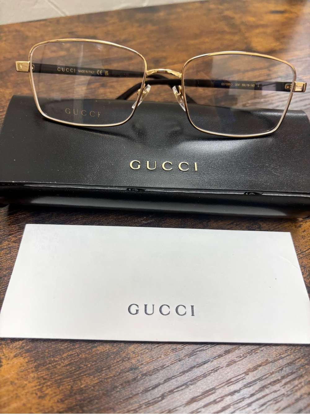 Gucci Men's Gold and Black Metal Frame Glasses